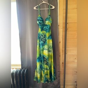 Size 10. Never worn, altered with open back and train